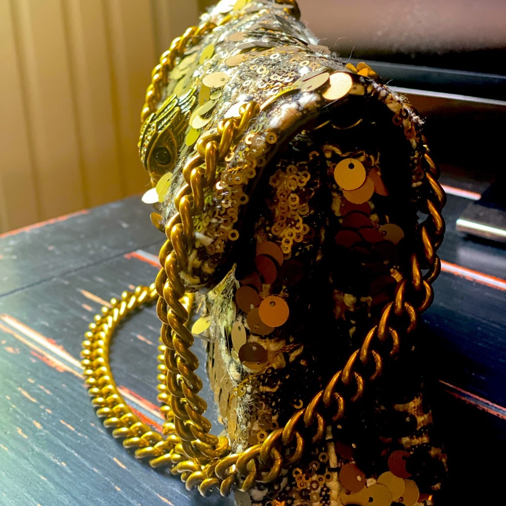 Kurt Geiger London gold color bag was worn once.